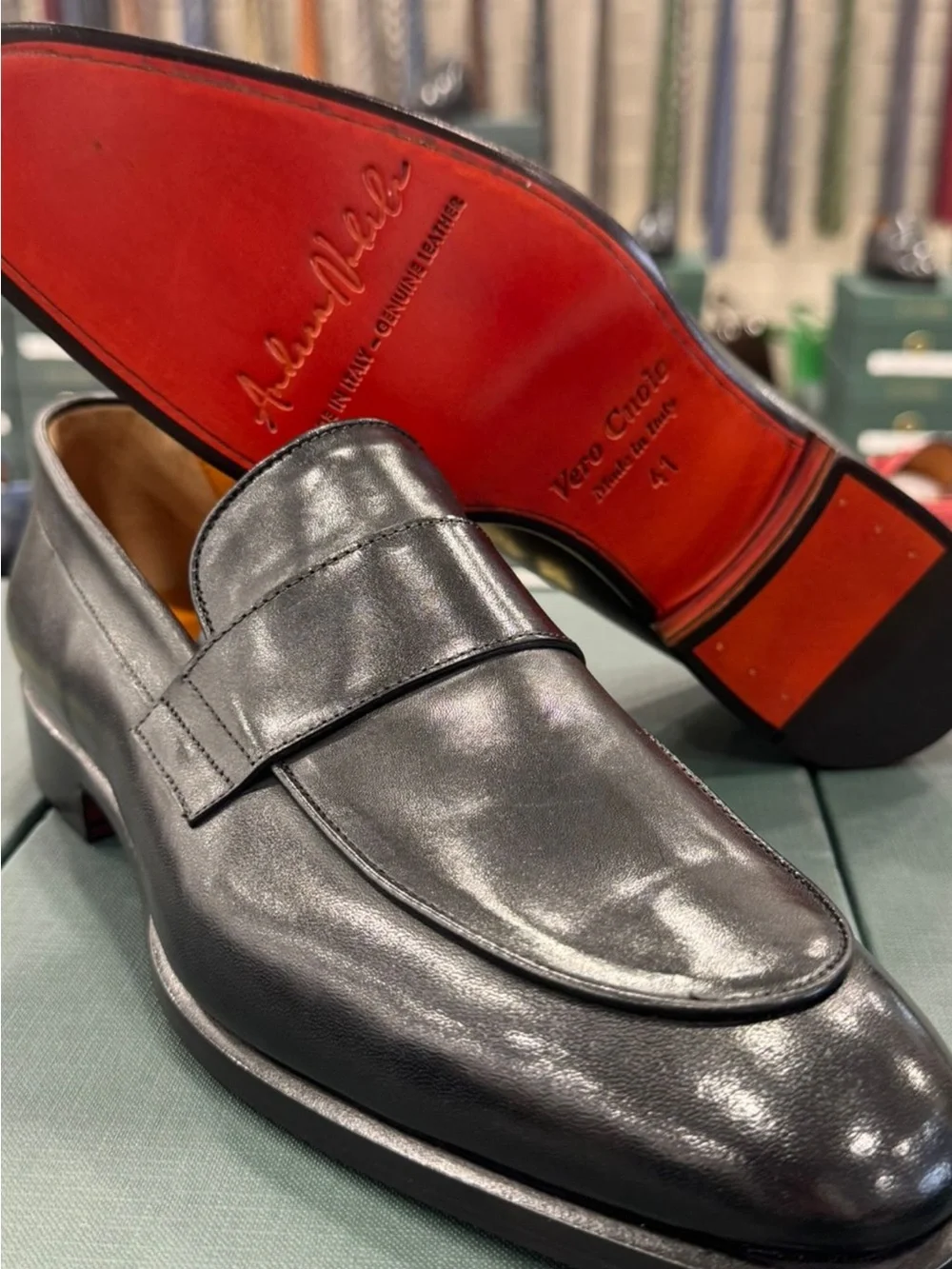 Classic Black Leather Men's Penny Loafers with patent red button